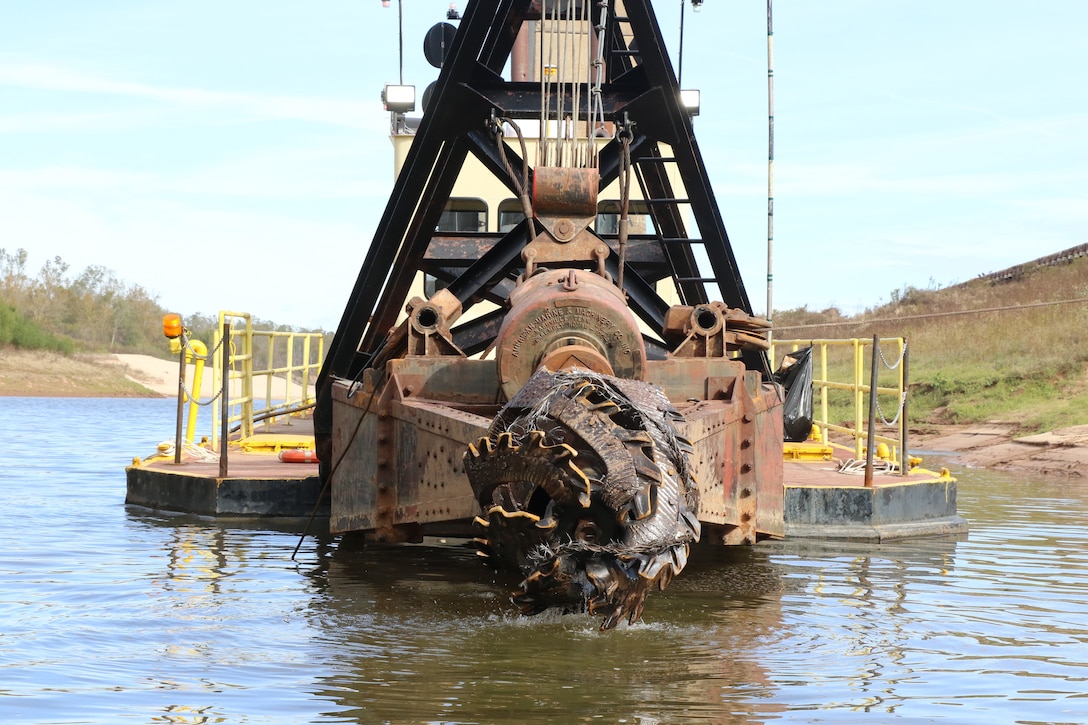 The Dubuque is a cutterhead type of dredge. It is equipped with a rotating cutting tool that loosens and extracts sediment from the navigation channel.