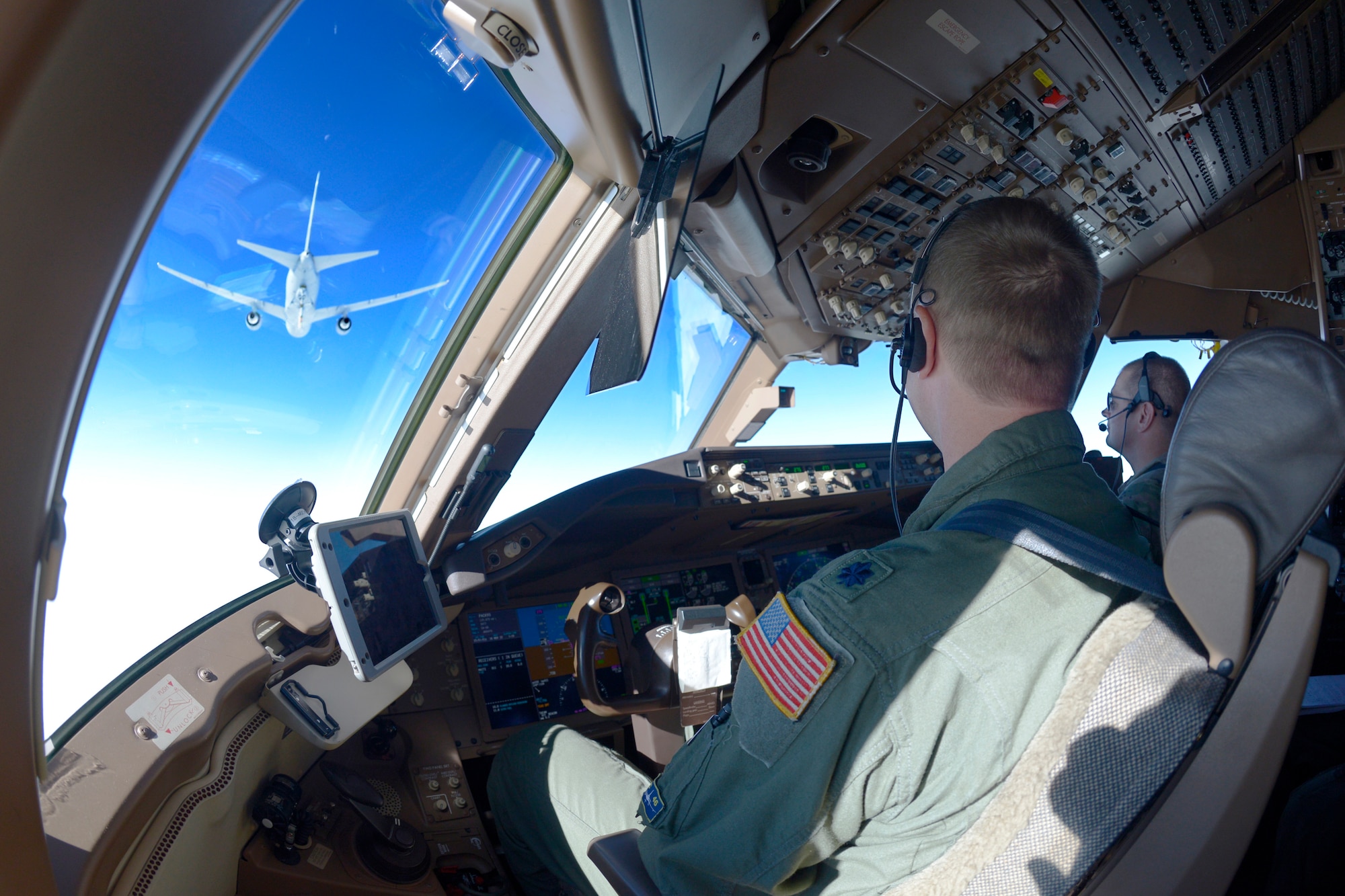 Lt. Col. Greg Van Splunder and Lt. Col. Brandon Stock, pilots with the 157th Air Refueling Wing, Pease Air National Guard Base, New Hampshire Air National Guard, guide their KC-46A Pegasus as it receives fuel from another Pease KC-46A during a 36-hour endurance mission, Nov. 16, 2022. 

The long-duration sortie took place from Nov. 16-18 and was crewed by active duty and Air National Guard Airmen from Pease, who flew the jet non-stop from New Hampshire, across North America and the Pacific Ocean, around Guam, and back home again. The proof-of-concept operation showcased the ability of the Air Force’s newest tanker to project the force in the modern battle space. (U.S. Air National Guard photo by Senior Master Sgt. Timm Huffman)