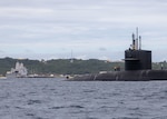 The Ohio-class guided-missile submarine USS Michigan (SSGN 727) made a brief stop for personnel near Okinawa, Japan as part of its deployment to the U.S. 7th Fleet area of operations, Nov. 10. Michigan is homeported at Naval Base Kitsap, Washington and is operating in the U.S. 7th Fleet area of operations, conducting maritime security operations and supporting national security interests.
