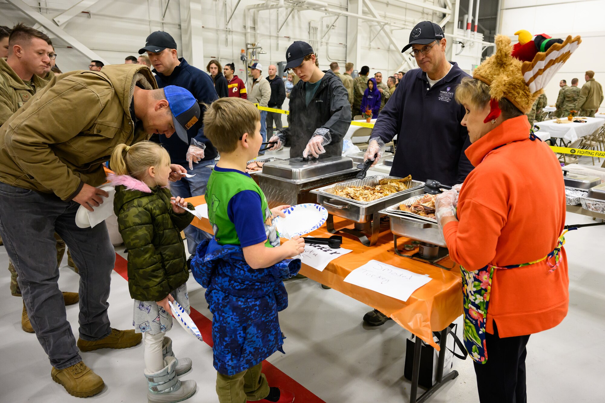 A photo of a thanksgiving meal in 388th Fighter Wing hangars.