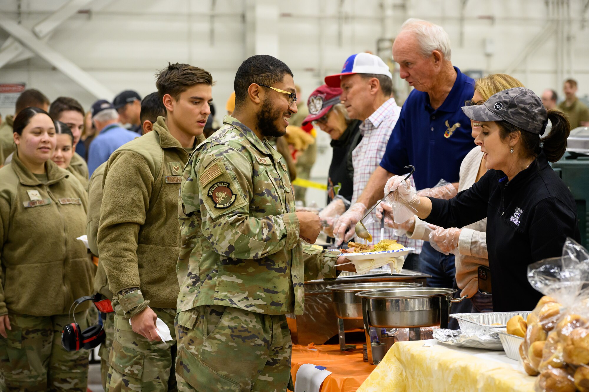 A photo of a thanksgiving meal in 388th Fighter Wing hangars.