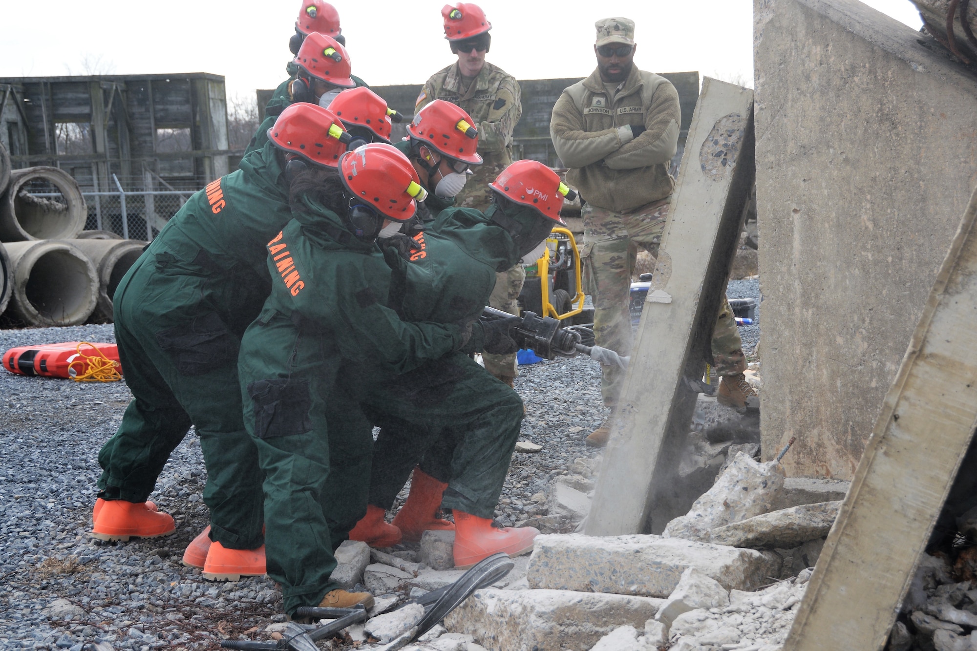 Service members from the Pennsylvania National Guard's 3rd CBRN (Chemical, Biological, Radiological, and Nuclear) Task Force drill through concrete during a Homeland Response Force collective training exercise Nov. 18, 2022, at Fort Indiantown Gap, Pa.