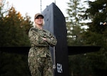 Lt. Cmdr. Amber Cowan, the executive officer of the gold crew of the Ohio-class ballistic-missile submarine USS Kentucky (SSBN 737), from Colorado Springs, Colorado, poses for a portrait at Deterrent Park onboard Naval Base Kitsap – Bangor, November 18, 2022.