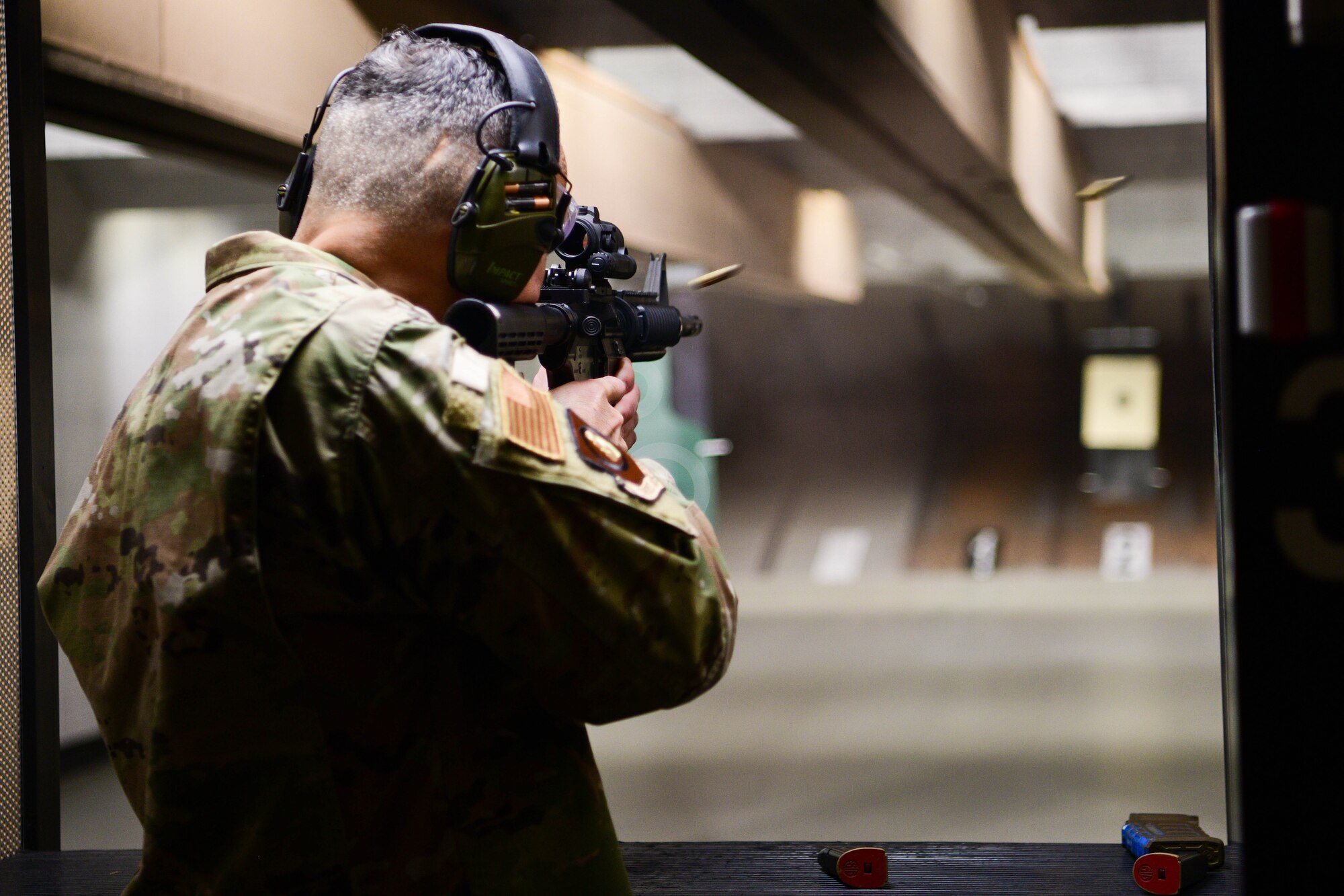 U.S. Air Force Chief Master Sgt. Heriberto Diaz, Third Air Force command chief, shoots a weapon during an immersion at the 31st Security Forces Squadron Combat Arms Training and Maintenance facility at Aviano Air Base, Italy, Nov. 22, 2022. As the Numbered Air Force’s Senior Enlisted Leader, Diaz advises the commander on issues affecting the readiness, organization, training, health, welfare, morale, development, and utilization of more than 30,000 Airmen. (U.S. Air Force photo by Senior Airman Brooke Moeder)