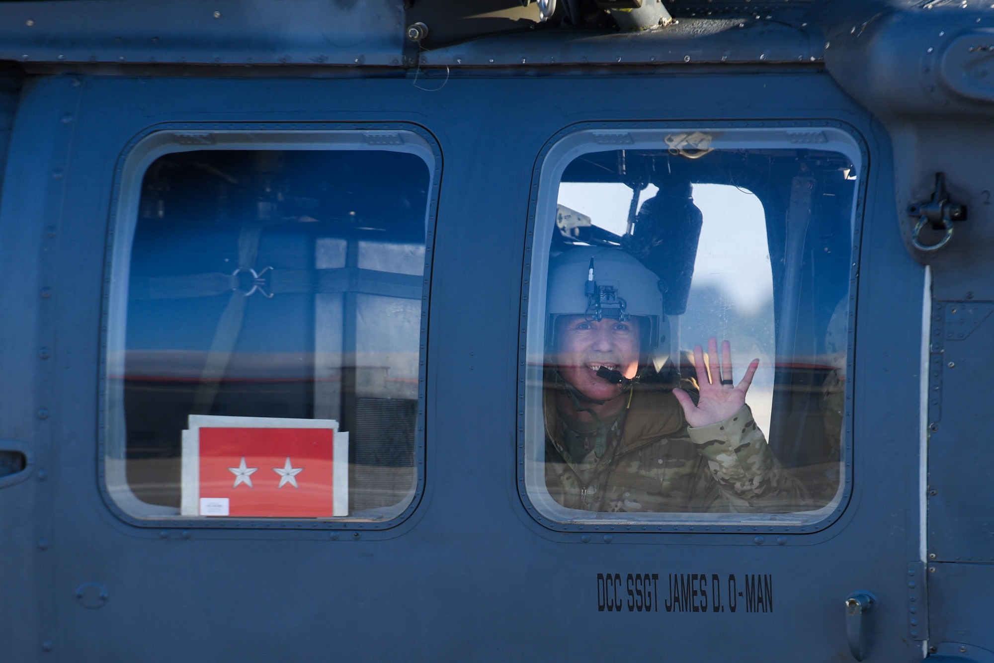 U.S. Air Force Chief Master Sgt. Heriberto Diaz, Third Air Force command chief, waves from an HH-60G Pave Hawk helicopter assigned to the 56th Rescue Squadron at Aviano Air Base, Italy, Nov. 22, 2022. During his visit, Diaz toured the 56th and 57th Rescue Squadrons, the 31st Security Forces Squadron Combat Arms Training and Maintenance facility, 606th Air Control Squadron, the Comprehensive Operational Medicine for Battle Ready Airmen clinic and more. (U.S. Air Force photo by Senior Airman Brooke Moeder)
