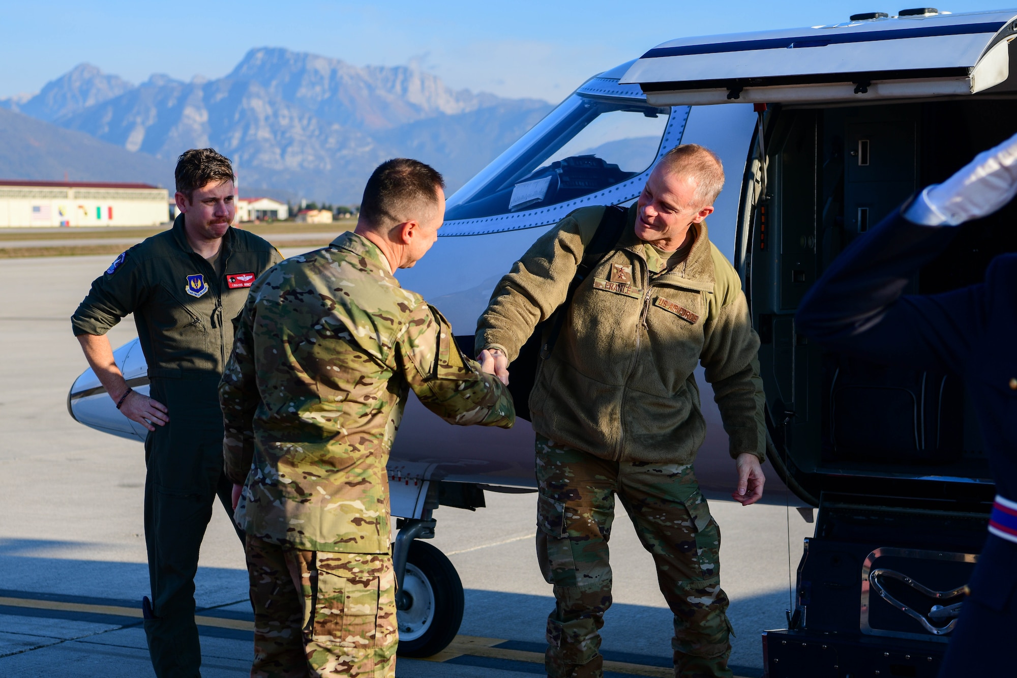 U.S. Air Force Maj. Gen. Derek France, Third Air Force commander, right, greets U.S. Air Force Brig. Gen. Tad Clark, 31st Fighter Wing commander, at Aviano Air Base, Italy, Nov. 21, 2022. During his visit, France toured the 56th and 57th Rescue Squadrons, the 31st Security Forces Squadron Combat Arms Training and Maintenance facility, 606th Air Control Squadron, Comprehensive Operational Medicine for Battle Ready Airmen clinic and more. (U.S. Air Force photo by Senior Airman Brooke Moeder)