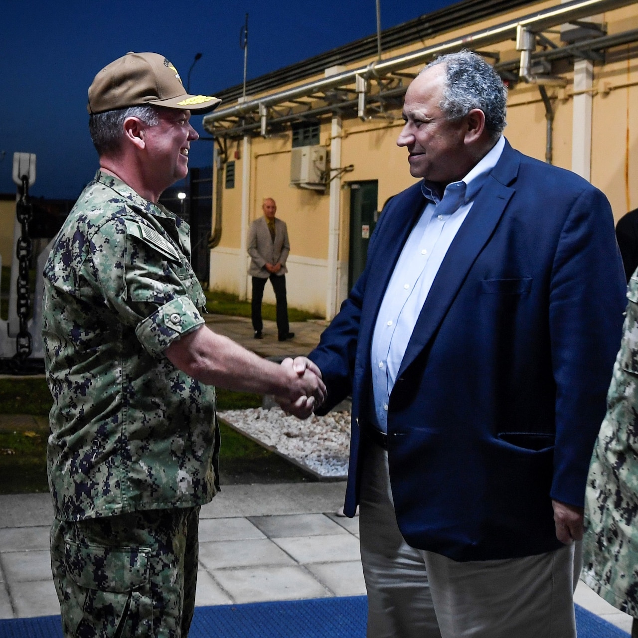 Vice Adm. Tomas Ishee, commander, U.S. Sixth Fleet and commander, Naval Striking and Support Forces NATO, left, greets the Honorable Carlos Del Toro, Secretary of the Navy, as Del Toro arrives onboard Naval Support Activity Naples, Italy for a scheduled visit to U.S. Naval Forces Europe and Africa and U.S. Sixth Fleet (NAVEUR/NAVAF/SIXHFLT) headquarters, Nov. 21, 2022. NAVEUR-NAVAF operates U.S. naval forces in the U.S. European Command (USEUCOM) and U.S. Africa Command (USAFRICOM) areas of responsibility. U.S. Sixth Fleet is permanently assigned to NAVEUR-NAVAF, and employs maritime forces through the full spectrum of joint and naval operations. (U.S. Navy photo by Chief Mass Communication Specialist Justin Stumberg)