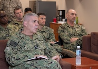 221123-N-QD718-1041 MANAMA, Bahrain (Nov. 23, 2022) Rear Adm. Gregory Todd, chief of chaplains of the Navy, meets with Sailors, Nov. 23, during a visit to a waterfront resiliency center at Naval Support Activity Bahrain where U.S. Naval Forces Central Command is headquartered.