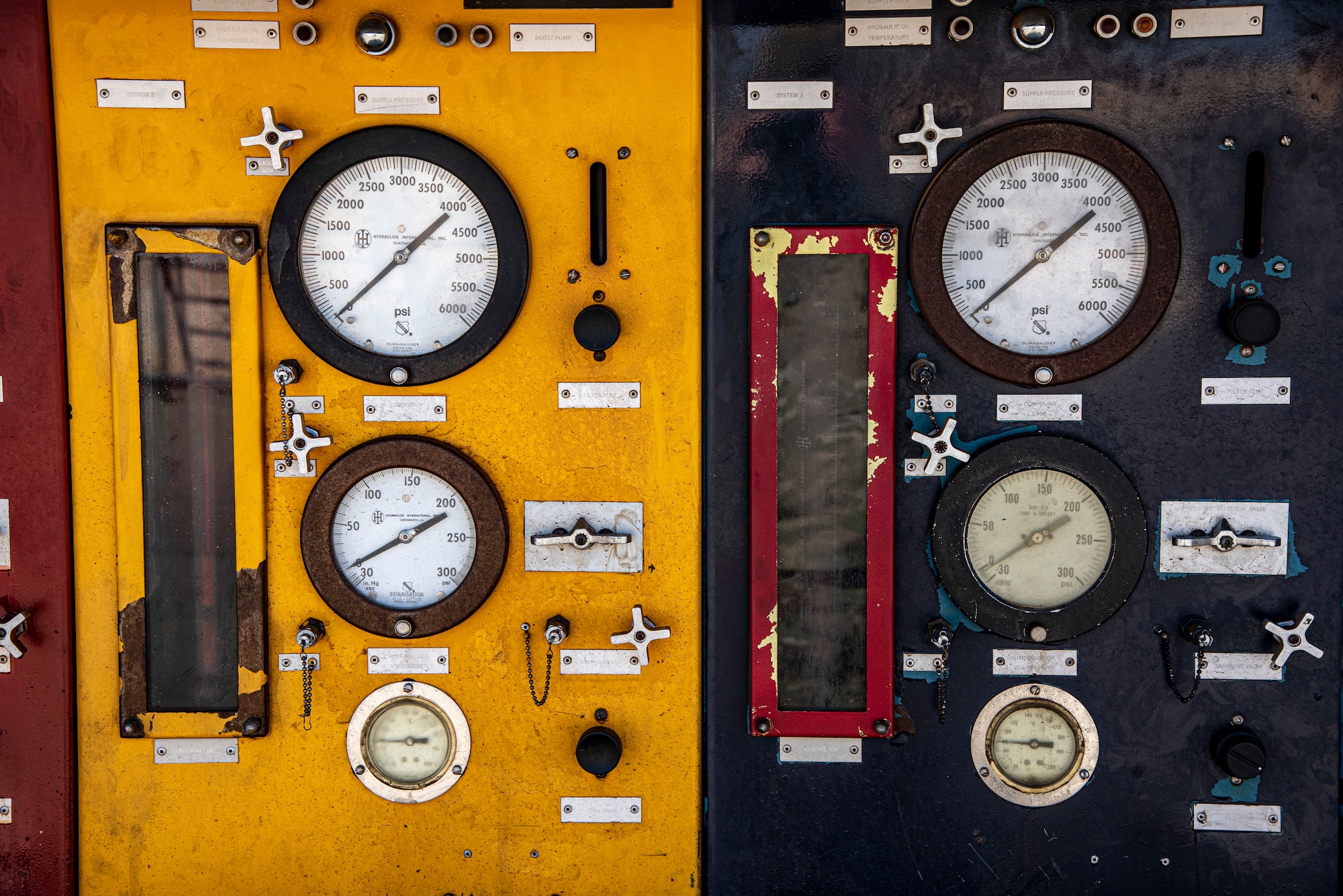 Pressure gauges and other meters on a hydraulic mule at an undisclosed location, Southwest Asia, Nov. 14, 2022. This hydraulic mule is used to test moving parts of an F-15E Fighting Falcon, such as wing flaps and landing gear. (U.S. Air Force photo by: Tech. Sgt. Jim Bentley)