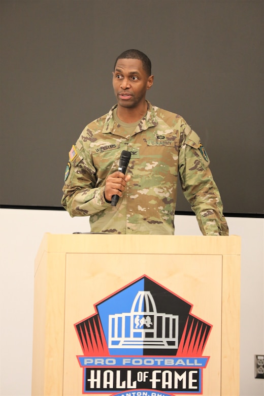 Col. Lawrence E. Williams, incoming commander for the 2nd Psychological Operations Group, gives an assumption of command speech to the Soldiers and families of the unit at the change of command ceremony. The ceremony was held on November 5, 2022, at the Pro Football Hall of Fame in Canton, Ohio. (US Army Photo Sgt. 1st Class Kevin Rayan)