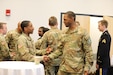 Soldiers of 2nd Psychological Operations Group congratulate and welcome incoming commander Col. Lawrence E. Williams who took command of the group on November 5, 2022, at the Pro Football Hall of Fame in Canton, OH. (US Army Photo Sgt. First Class Kevin Rayan)