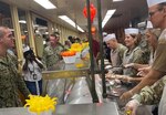 Gen. Laura Richardson, commander, U.S. Southern Command, center, serves Thanksgiving lunch to service members at U.S. Naval Station Guantanamo Bay, Cuba, Nov. 24, 2022.