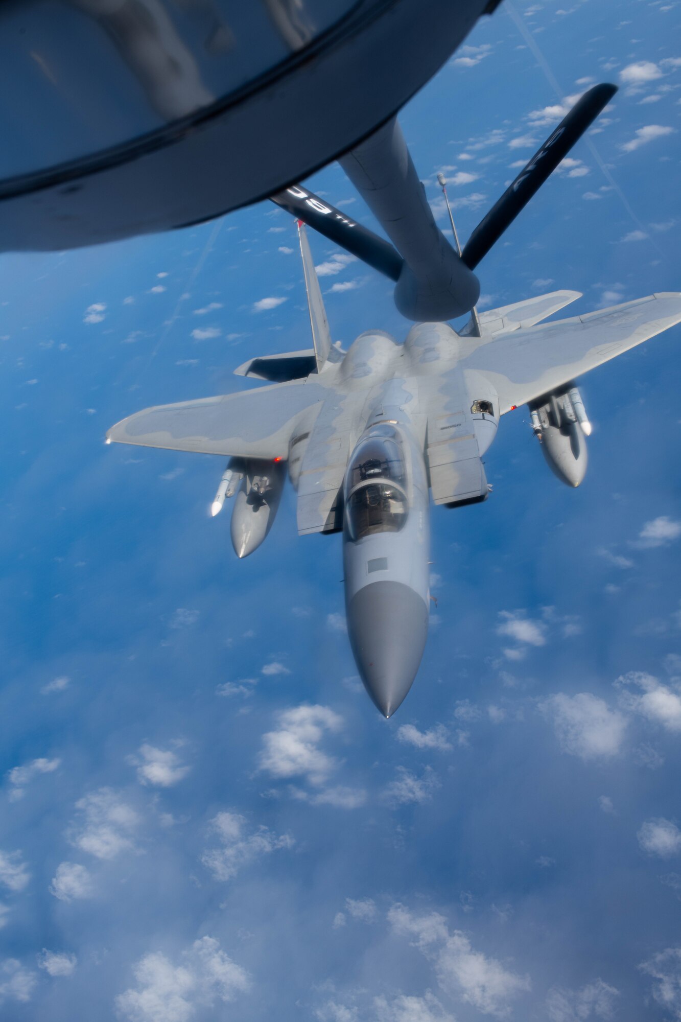 A jet prepares for aerial refueling.