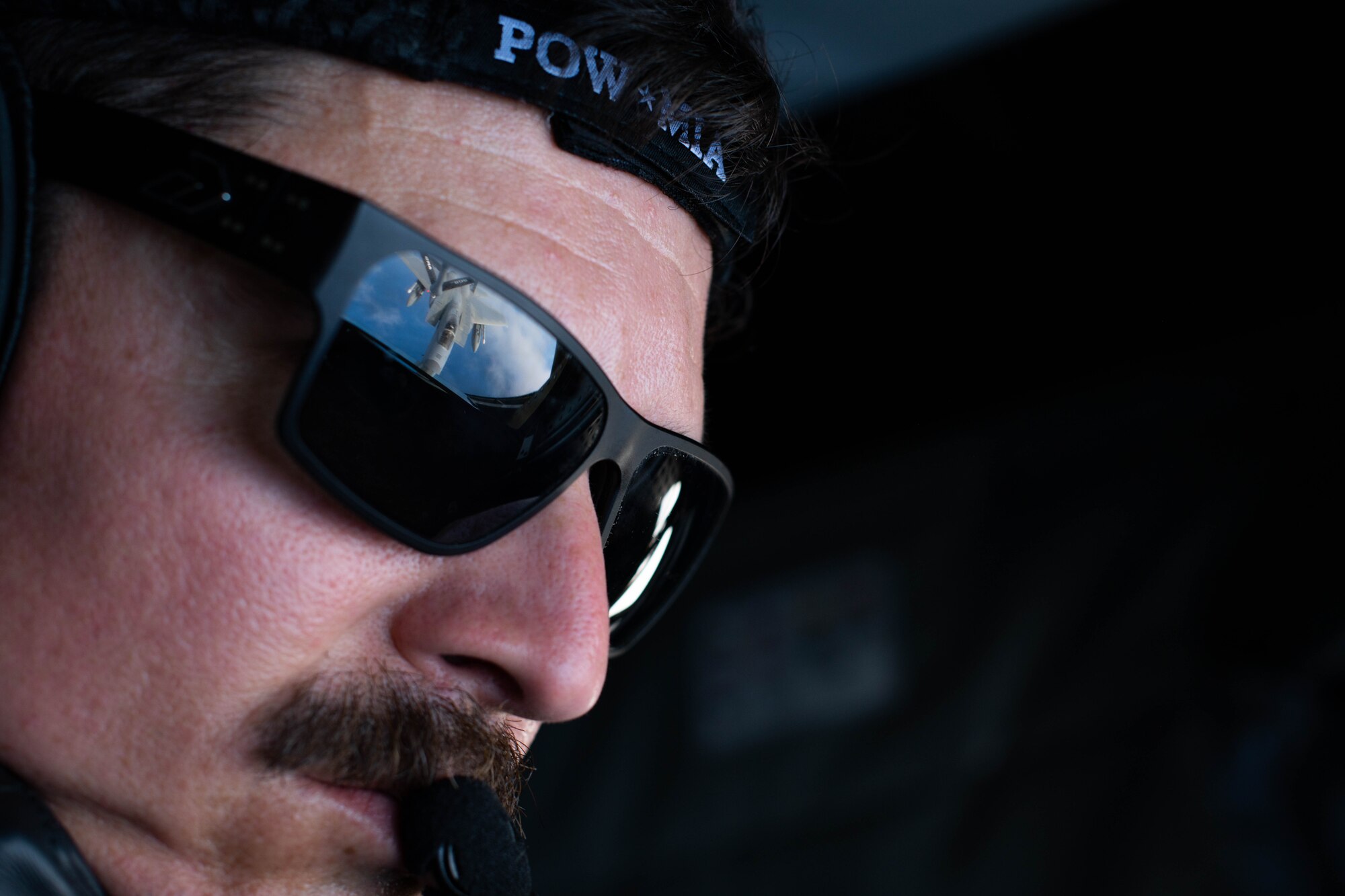 An Airman conducts aerial refueling.