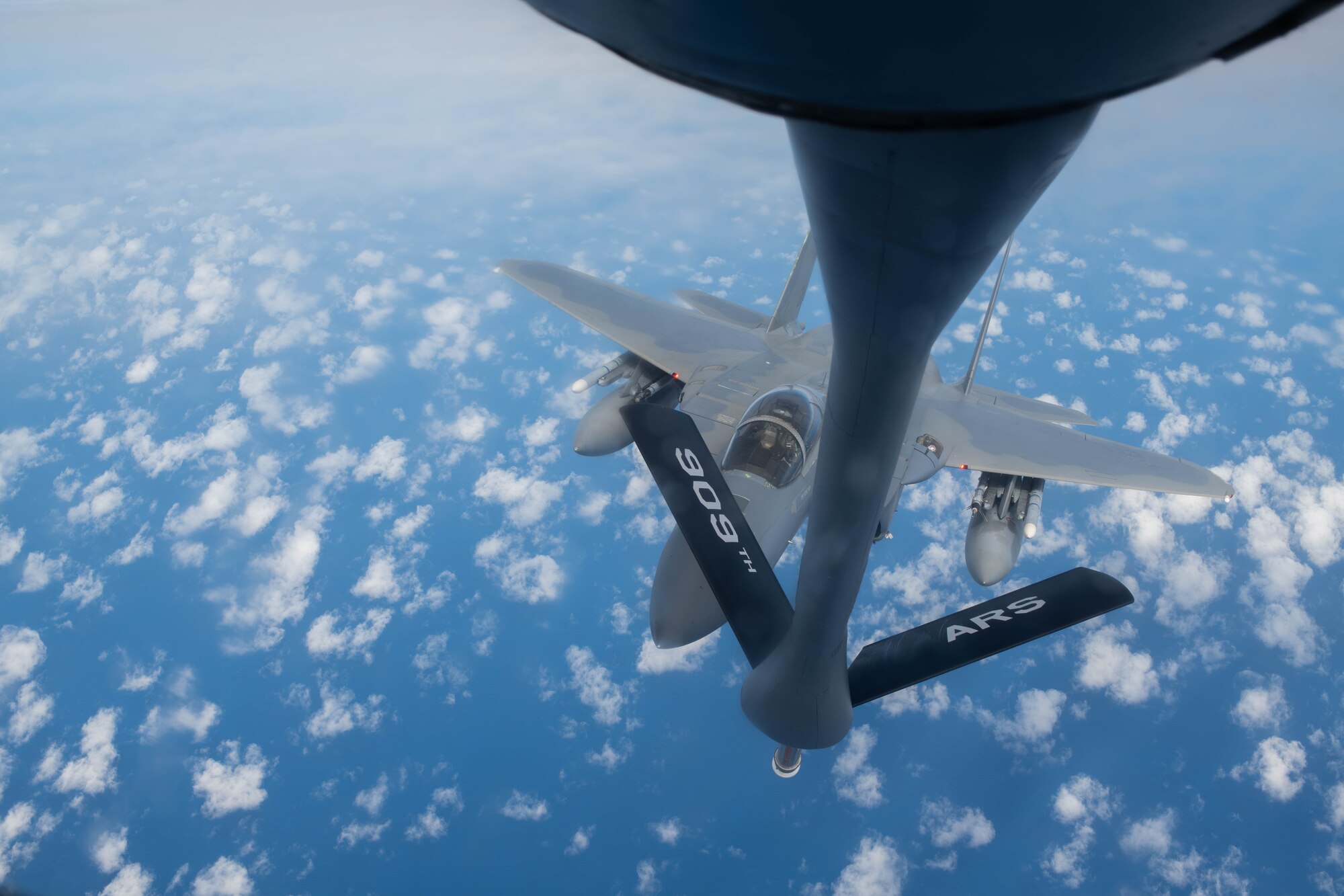 A jet prepares for aerial refueling.
