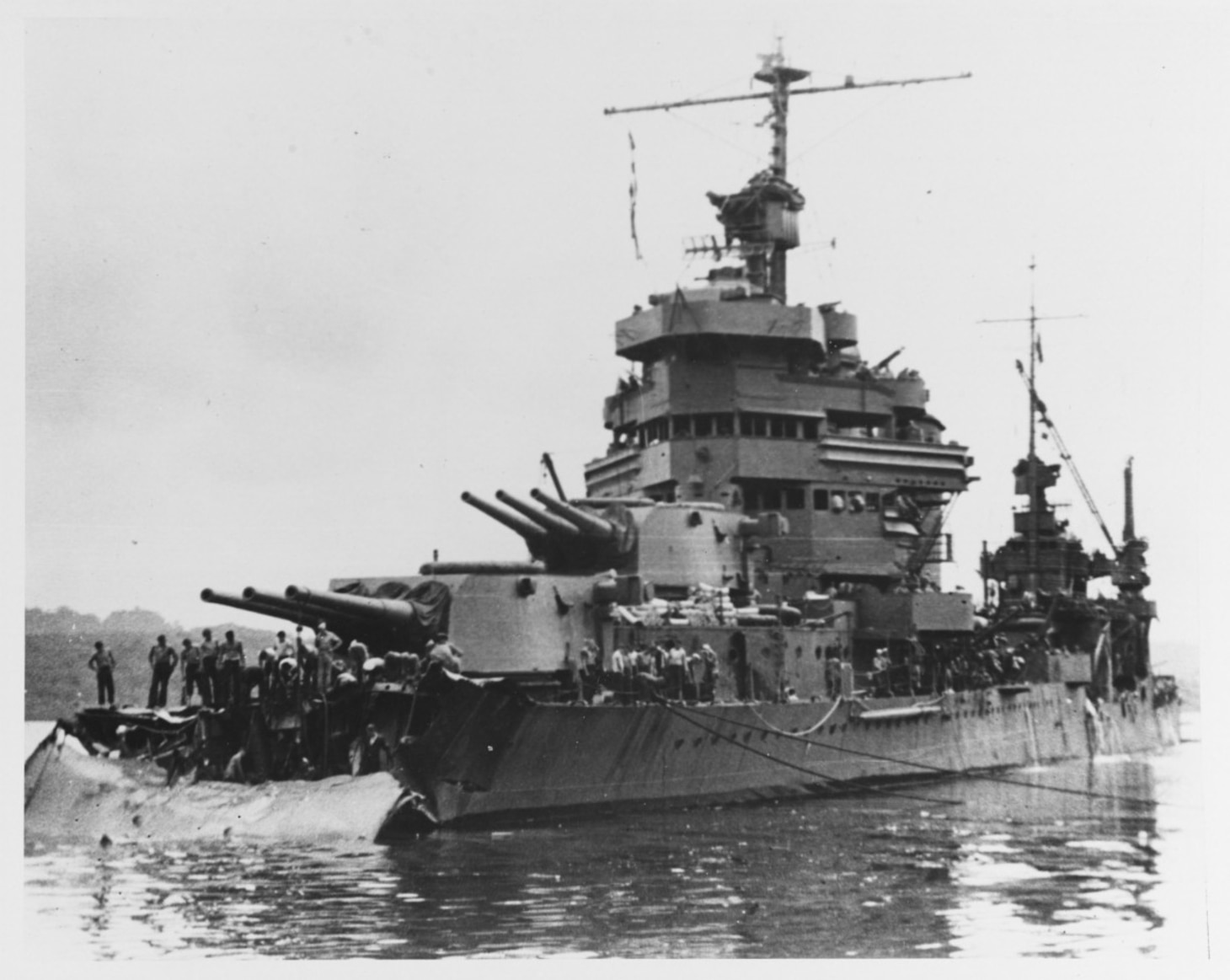 Battle of Tassafaronga, 30 November 1942. USS Minneapolis (CA-36) at Tulagi with torpedo damage received in the battle. Photograph was taken on 01 December 1942, as work began to cut away the wreckage of her bow. Official U.S. Navy Photograph, now in the collections of the U.S. National Archives. (NHHC 80-G-211215)