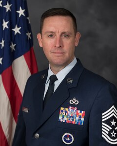 The official bio photo of Chief Master Sergeant Joshua S. Trundle.
