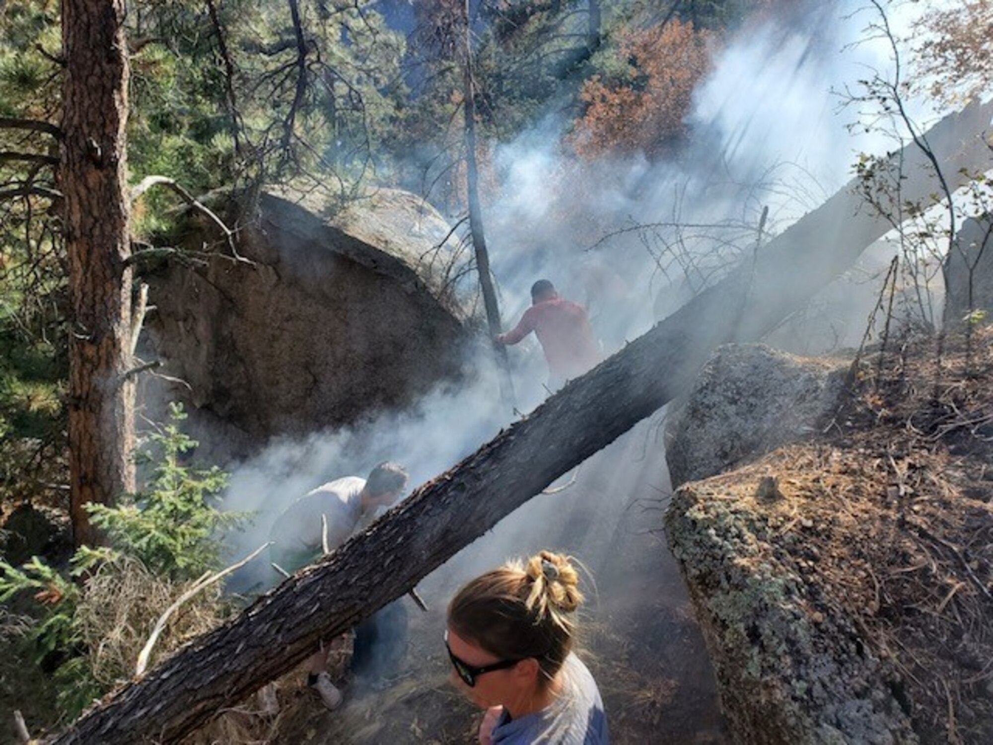 people putting out fire
