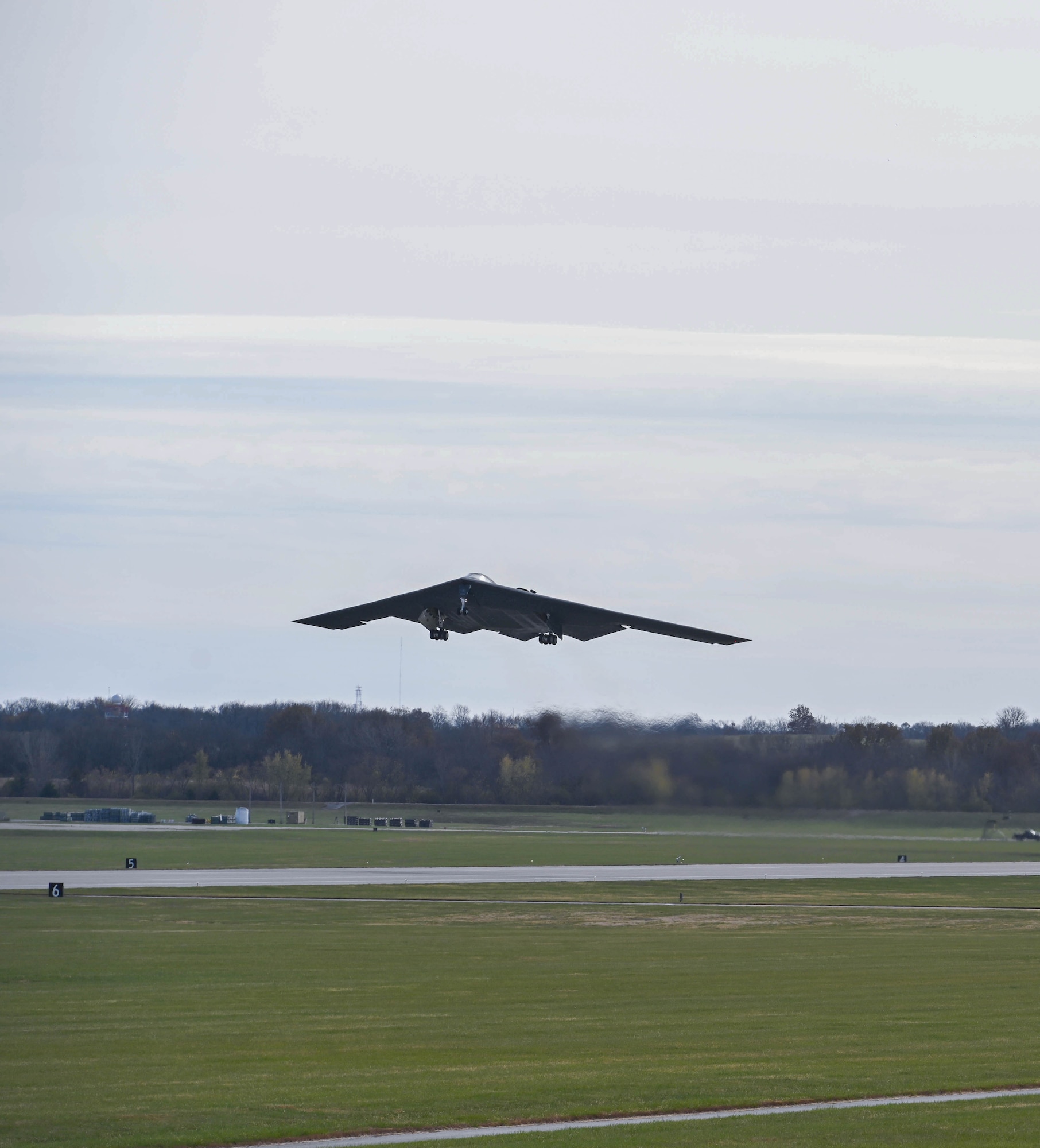 A B-2 Spirit stealth bombers assigned to the 509th Bomb Wing takes off at Whiteman Air Force Base, Missouri November 7, 2022. The B-2 participated in Spirit Vigilance, a routine training exercise designed to test the wing's readiness to conduct deterrence and combat operations. (U.S. Air Force photo by Airman 1st Class Hailey Farrell)