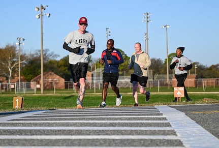 Service members participate in a NAHM Warrior's Run