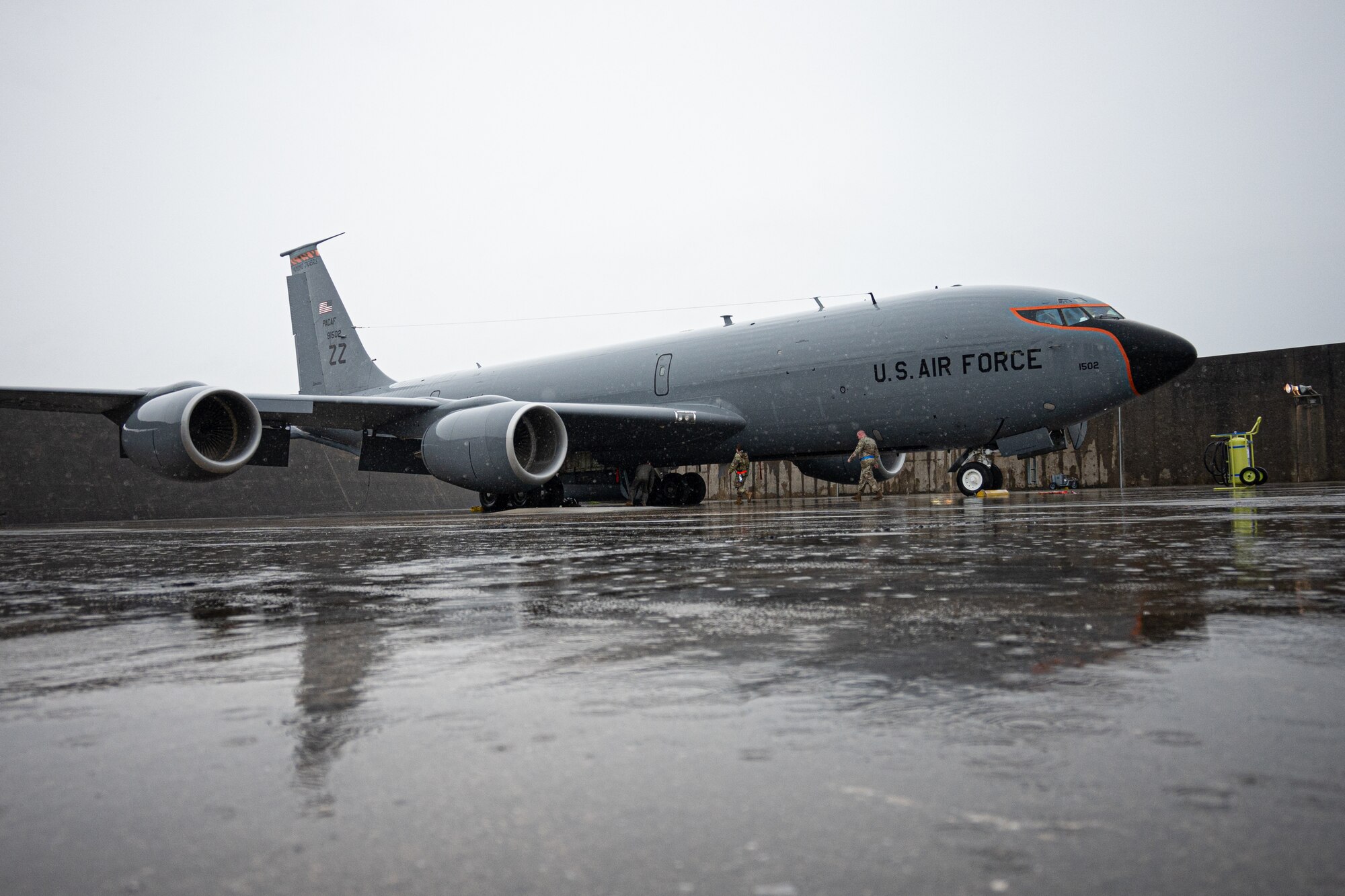 A jet is parked on the flightline.