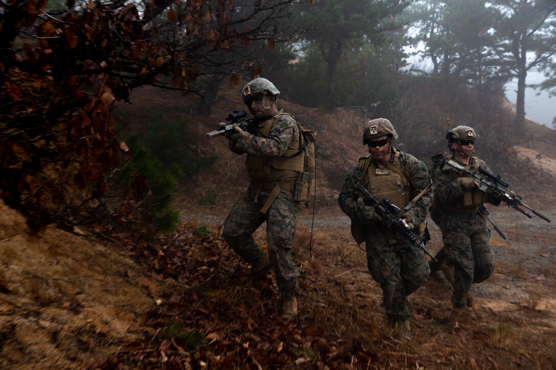 U.S. Marines with 3d Battalion, 4th Marines participate in a platoon attack during Korea Marine Exercise Program (KMEP) 23.1 at Rodriguez Live Fire Complex, Republic of Korea, Nov. 22. KMEP is conducted routinely to maintain the trust, proficiency, and readiness of the ROK-U.S. Alliance. 3d Battalion, 4th Marines is forward deployed in the Indo-Pacific under 4th Marines, 3d Marine Division as part of the Unit Deployment Program. (U.S. Marine Corps photo by Lance Cpl. Michael Taggart)