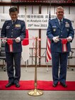 Lt. Gen. SUZUKI Yasuhiko, Vice Chief of Staff, Japan Joint Staff and Lt. Gen. Ricky Rupp, commander, U.S. Forces Japan perform a ceremonial ribbon cutting during the U.S.-Japan Bilateral Intelligence Analysis Cell Opening Ceremony