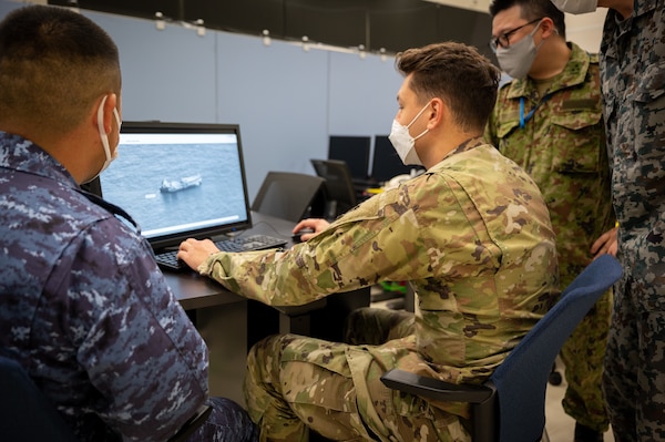 Servicemembers from US Forces and Japan Self Defense Forces work side by side in the U.S.-Japan Bilateral Intelligence Analysis Cell