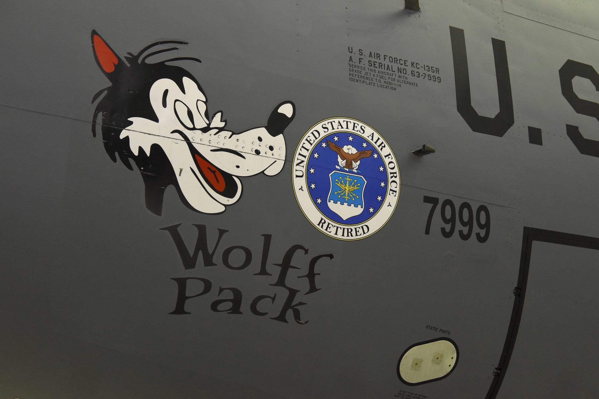 Aircraft 7999, a 59-year-old KC-135 Stratotanker, shows off its “retirement pin” after a retirement ceremony at Royal Air Force Mildenhall, England, Nov. 23, 2022. The jet is now at its final resting place at Davis-Monthan Air Base, Arizona, also known as “The Bone Yard” but the legacy “Wolff Pack” nose art will remain at RAF Mildenhall and be transferred to another aircraft. This was the first official retirement of a KC-135 at RAF Mildenhall. (U.S. Air Force photo by Karen Abeyasekere)