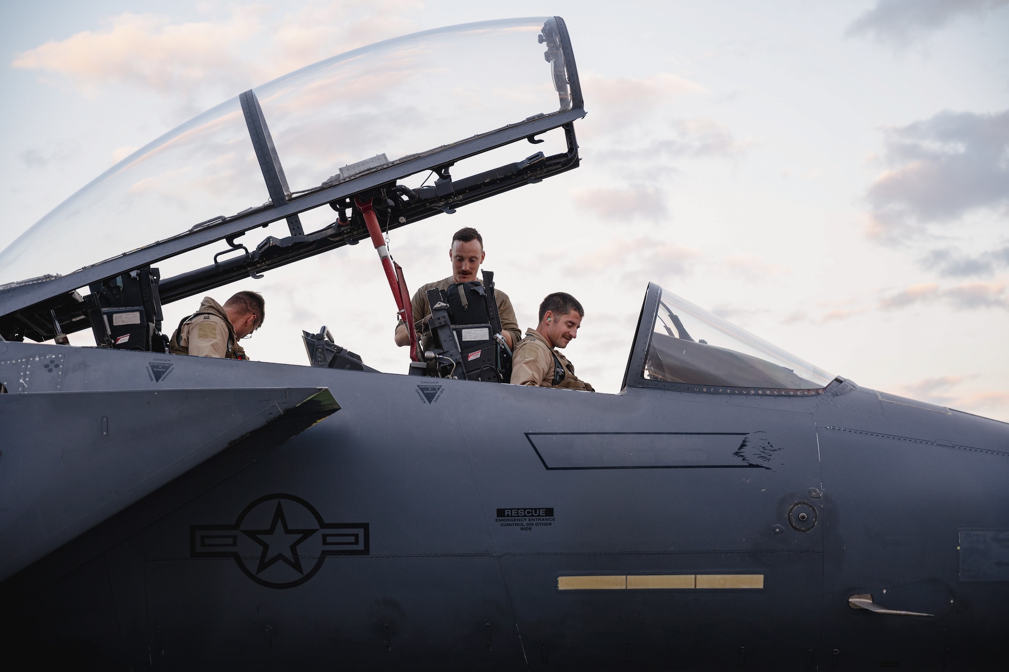 Airmen from the 389th Expeditionary Fighter Squadron prepare an F-15E Strike Eagle fighter jet for takeoff during the “Maintainer for a Day” program at an undisclosed location, Nov. 10, 2022. Maintainer for a Day is an initiative that pairs Airmen across a variety of career fields with members of aircraft maintenance shops for a hands-on learning experience with F-15E Strike Eagle fighter jets. (U.S. Air Force photo by Tech. Sgt. Richard Mekkri)