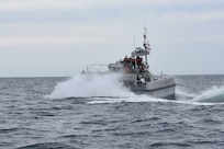 A 47-foot Motor Life Boat crew from U.S. Coast Guard Station Barnegat Light, in Ocean County, New Jersey, is shown here exiting the Barnegat Inlet and into the Atlantic Ocean, Aug. 8, 2021.  U.S. Coast Guard Photo by SN Kesami Hitaffer.