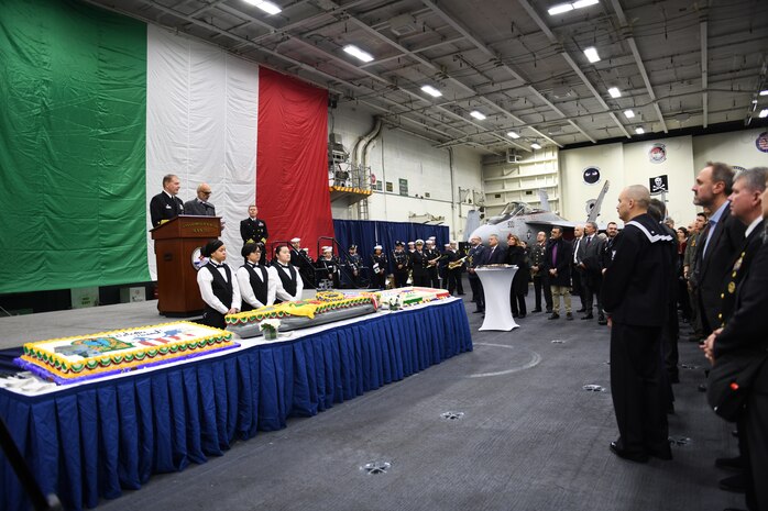 Culinary Specialists pose for a photo after a reception held for local military and civilian leaders, honoring the U.S.–Italian relationship aboard the Nimitz-class aircraft carrier USS George H.W. Bush (CVN 77) during a scheduled port visit, Nov. 29, 2022.