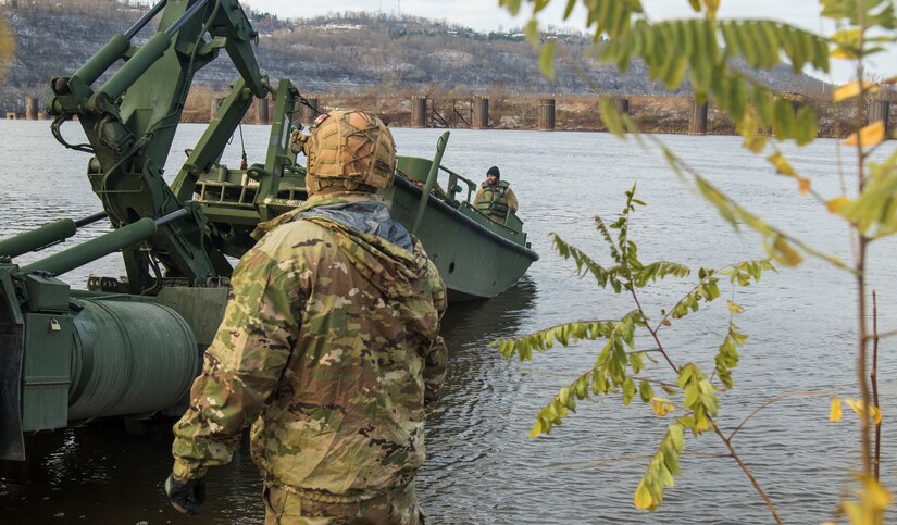 Army Reserve Soldiers cross the Ohio River during weekend training