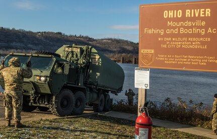 Army Reserve Soldiers cross the Ohio River during weekend training