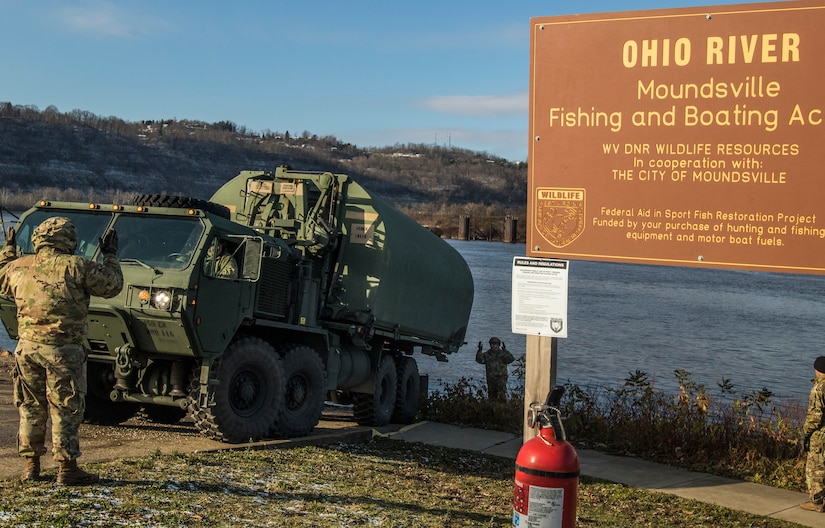Army Reserve Soldiers cross the Ohio River during weekend training