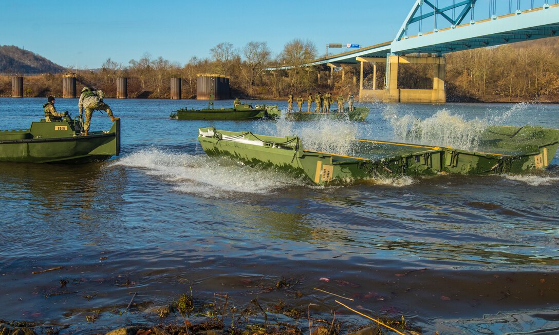 Army Reserve Soldiers cross the Ohio River during weekend training