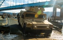 Army Reserve Soldiers cross the Ohio River during weekend training