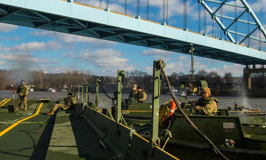 Army Reserve Soldiers cross the Ohio River during weekend training