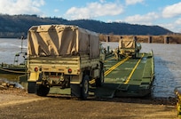 Army Reserve Soldiers cross the Ohio River during weekend training