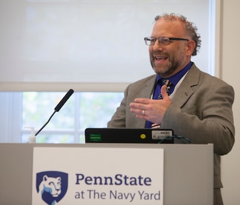 Senior Acoustics Engineer Sherwood (Woody) Polter from Naval Surface Warfare Center, Philadelphia Division presents Real-time Data Visualization of Machinery Data from Embedded Sensor Nodes at the Naval Innovative Science and Engineering (NISE) Summit at Penn State University at the Navy Yard in Philadelphia on Oct. 12, 2022. (U.S. Navy Photo by Gary Ell/Released)