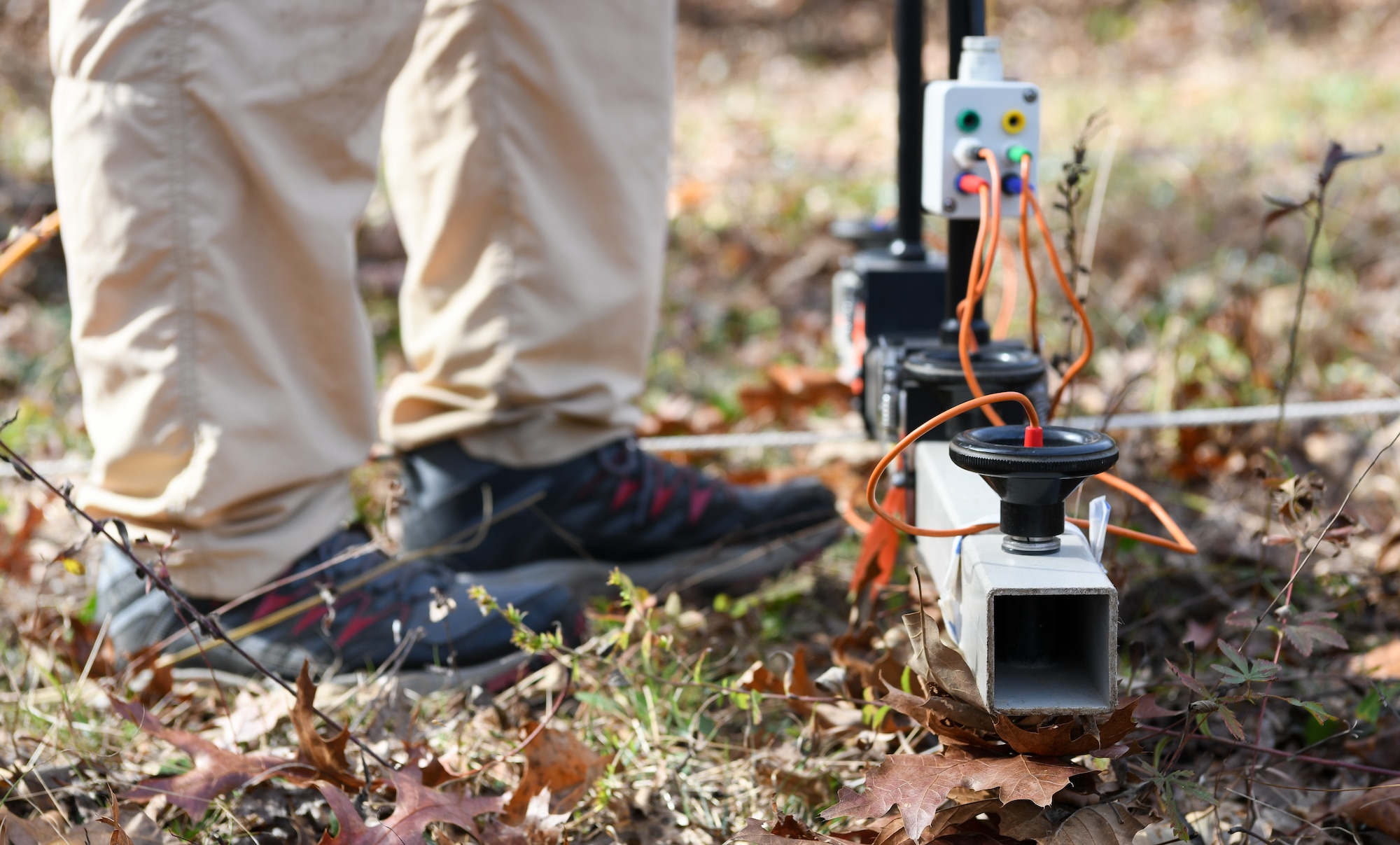 Steve Martin, an archaeologist who specializes in geophysics, uses an electrical resistance meter to survey the Chapel Hill Cemetery at Arnold Air Force Base, Tennessee, Nov. 10, 2022. (U.S. Air Force photo by Jill Pickett)