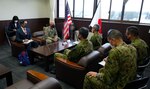 U.S. Army Corps of Engineers – Japan Engineer District (USACE JED) commander, Col. Gary Bonham, middle left, meets with Japanese Ground Self Defense Force (JGSDF) engineer school commandant, Maj. Gen. Yoshihiro Yamasaki, middle right near flag, during a visit to Camp Katsuta, in Ibaraki prefecture, Japan, Nov. 21, 2022. The visit to the engineer school was the first time for Col. Bonham since he assumed command of JED, and he took the opportunity to speak with commandant Yamasaki about ways to further relations between JED and the JGSDF and share information regarding engineering methodology and lessons learned from armed conflicts.