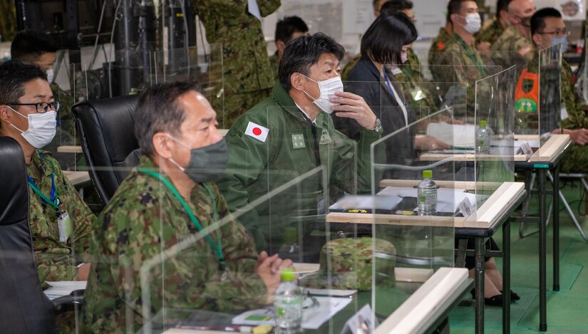 The Hon. Tsuyohito Iwamoto, Parliamentary Vice-Minister of Defense and Gen. Koji Yamazaki, chairman of the Japan Joint Staff, visited Camp Itami Dec. 9, during exercise Yama Sakura 81.

Iwamoto and Yamazaki were welcomed by Lt. Gen Shin Nozawa, 陸上自衛隊 中部方面隊 commander, and taken on battlefield circulation of the Bilateral Operations Center. Yamazaki was later taken to the Central Control Facility where he was welcomed by Maj. Gen. JB Vowell, U.S. Army Japan commander.

Yama Sakura 81 is the largest U.S.-Japan bilateral and joint command post exercise which enables participants to work as dedicated partners in support of the U.S.-Japan security alliance and for continued peace and stability in the Indo-Pacific. This year's exercise commemorates the 40th anniversary of Yama Sakura.

U.S. Navy photos by Mass Communications Specialist 3rd Class Donovan Zeanah