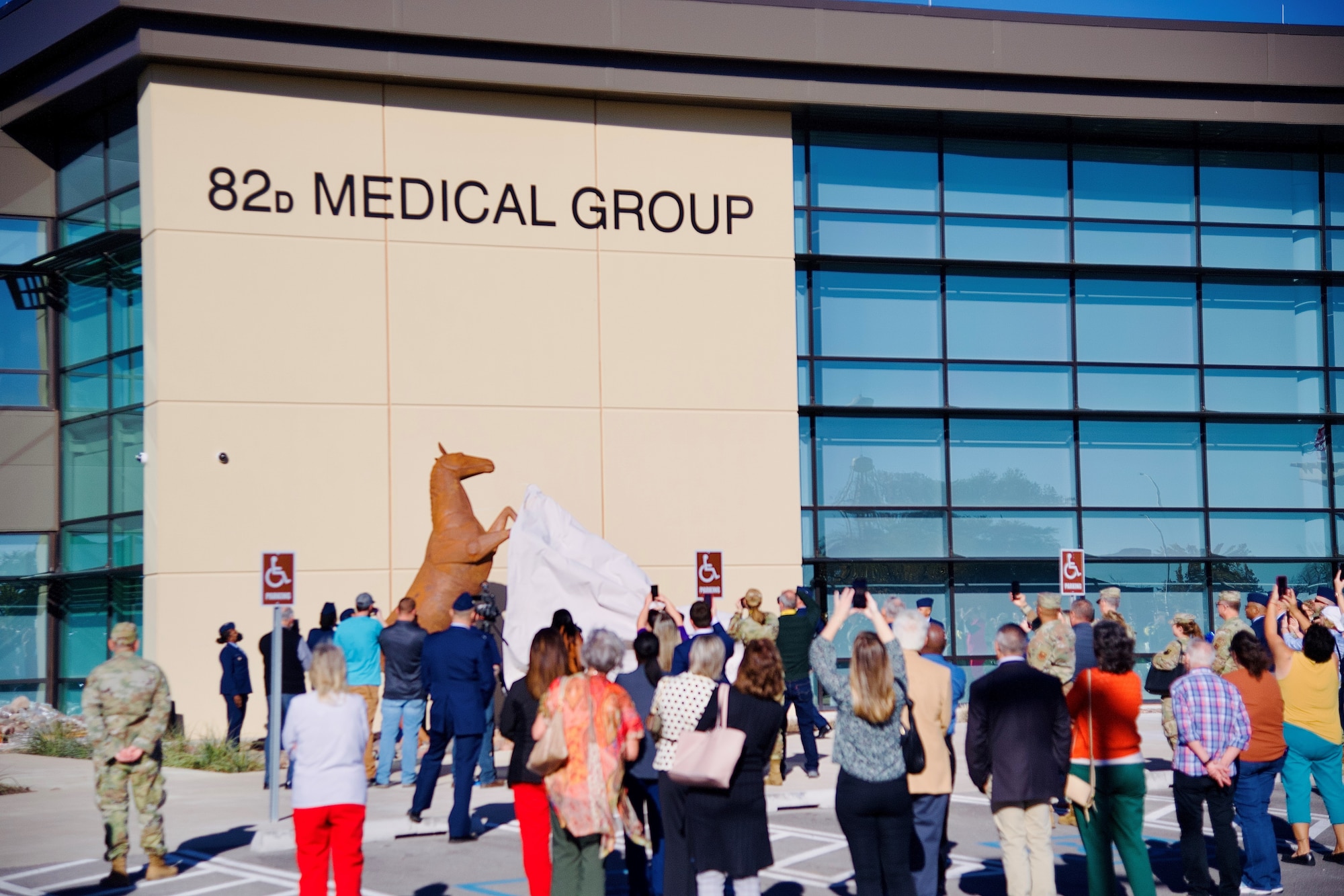 Sheppard Air Force Base’s 82nd Medical Group unveiled a sculpture of its mascot, the Texas Mustang, at a ribbon-cutting ceremony for its new medical treatment facility on Nov. 29, 2022. (U.S. Air Force photo by 1st Lt. Matt Carey). Several hundred Airmen, community partners and friends joined Sheppard AFB officials to cut the ribbon on the base’s newly opened, $94 million medical treatment facility Nov. 29.