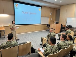 CATONSVILLE, Md. – Rear Adm. Jennifer Couture, commander, Naval Service Training Command (NSTC), speaks to University of Maryland Consortium (Baltimore County) Naval Reserve Officers Training Corps (NROTC) midshipmen, during a recent visit to the school here, September 15. Couture spoke to the unit about leadership, changes to the NROTC program to improve training, Warrior Toughness and the need for warfighters to be ready to lead the U. S. Navy and Marine Corps into the future. (U. S. Navy photo by UMBC NROTC/Released)