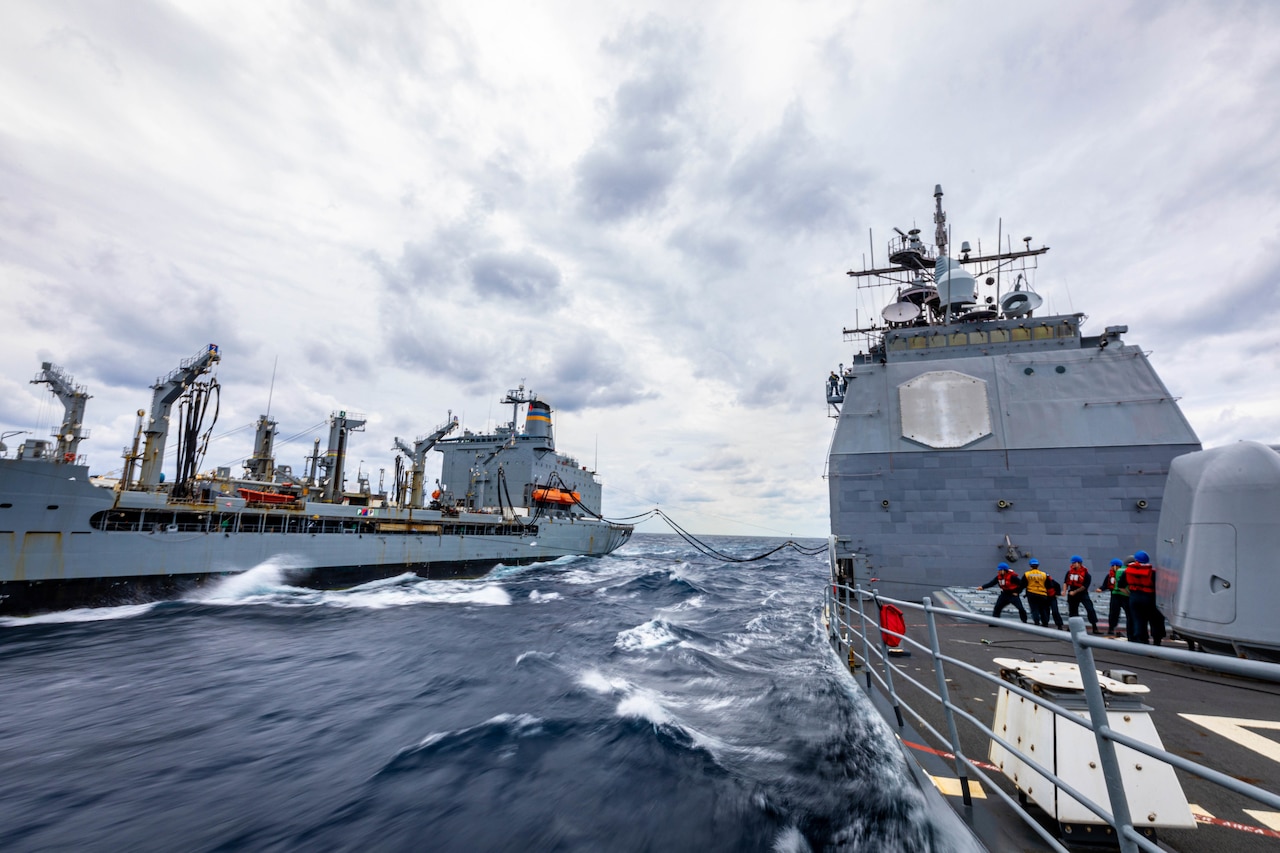 Ships pass supplies.