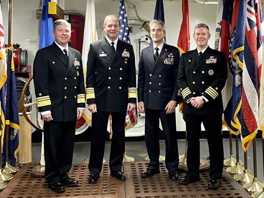 From left to right, Vice Adm. Thomas E. Ishee, commander, U.S. Sixth Fleet and Naval Striking and Support Forces NATO, Adm. Stuart Munsch, Commander, U.S. Naval Forces Europe-Africa and Allied Joint Forces Command Naples, Italy, Italian Head of Navy Adm. Enrico Credendino, and Capt. Dave Pollard, Commanding Officer, USS George H. W. Bush (CVN 77), pose for a photo after a reception for local military and civilian leaders, honoring the U.S.–Italian relationship aboard the Nimitz-class aircraft carrier USS George H.W. Bush (CVN 77) during a scheduled port visit, Nov. 29, 2022.