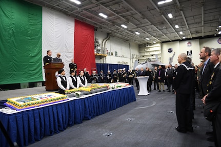 Culinary Specialists pose for a photo after a reception held for local military and civilian leaders, honoring the U.S.–Italian relationship aboard the Nimitz-class aircraft carrier USS George H.W. Bush (CVN 77) during a scheduled port visit, Nov. 29, 2022.
