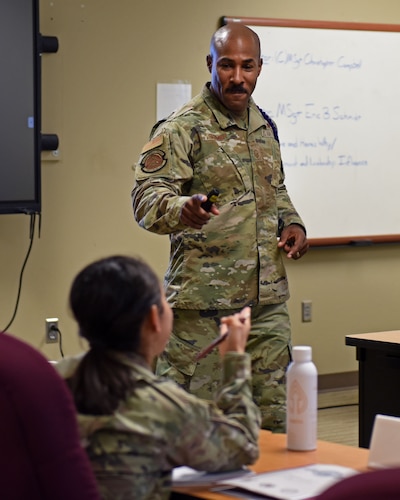 U.S. Air Force Master Sgt. Eric Schmidt, 17th Civil Engineer Squadron senior enlisted leader, discusses empowerment during the Airpower Leadership Academy, Goodfellow Air Force Base, Texas, Nov. 28, 2022. Students were asked to ponder the difference between delegation and empowerment. (U.S. Air Force photo by Airman 1st Class Sarah Williams)