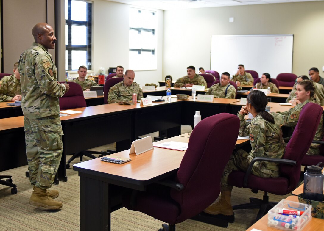 U.S. Air Force Master Sgt. Eric Schmidt, 17th Civil Engineer Squadron senior enlisted leader, speaks to students during the Airpower Leadership Academy, Goodfellow Air Force Base, Texas, Nov. 28, 2022. Attendees were hand selected to participate in the weeklong course to develop leadership skills and techniques. (U.S. Air Force photo by Airman 1st Class Sarah Williams)